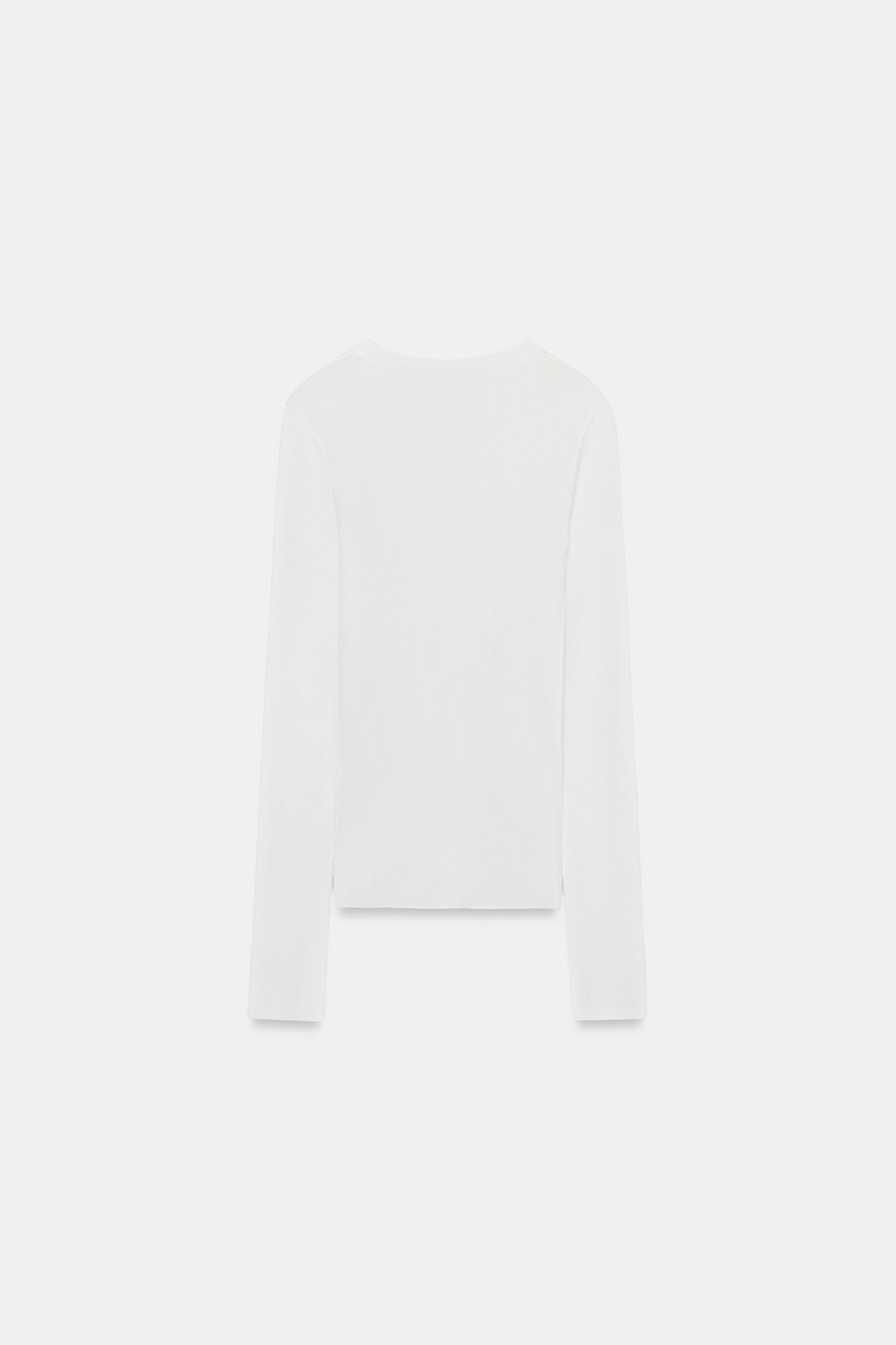 TOP EN MAILLE SEMI-TRANSPARENT